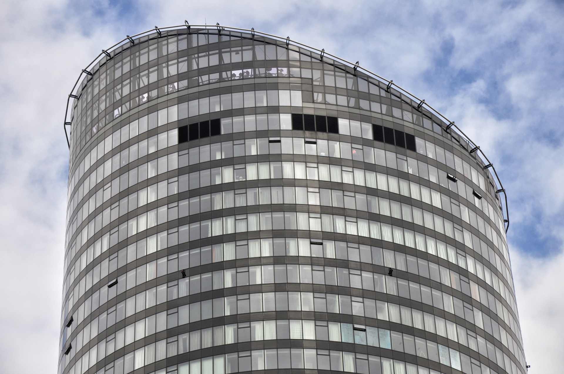 Curved glass skyscraper facade